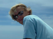 Leaving Antigua, Mark wearing polarized sunglasses on loan from Tris